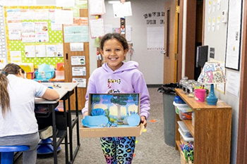 Our third-graders proudly present their vibrant habitat projects, showcasing the wonders of rainforests, deserts, and oceans. Each display is a testament to their curiosity and creativity.